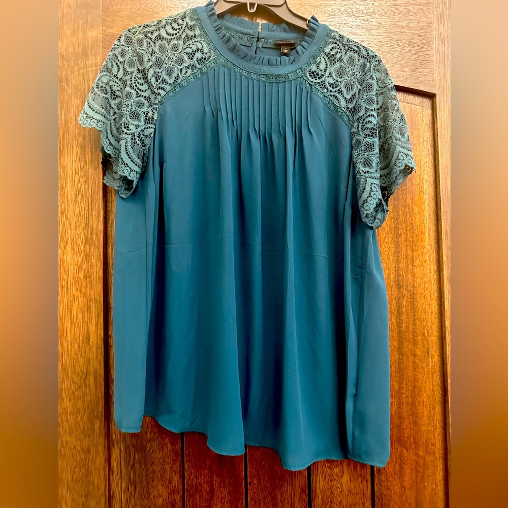 Teal Torrid top worn once